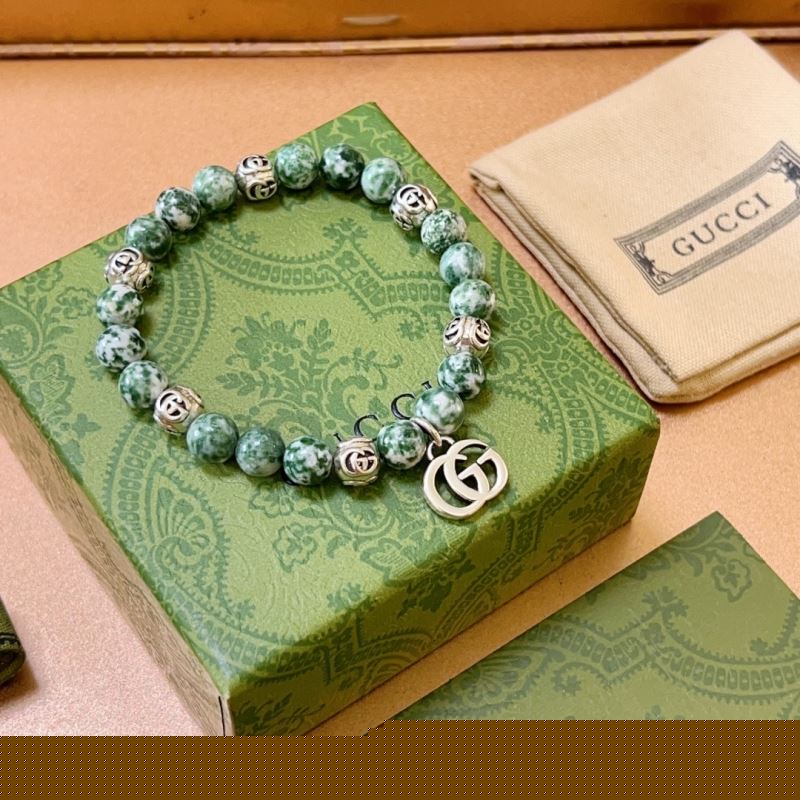 G*u*i bracelets